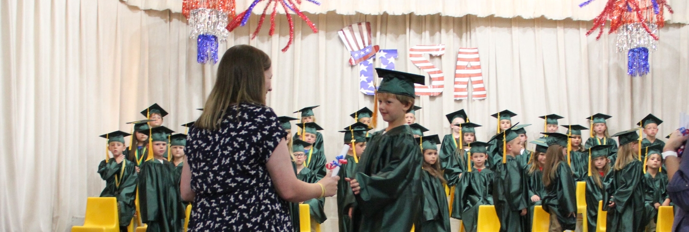 Image of Kindergarten students at graduation ceremony